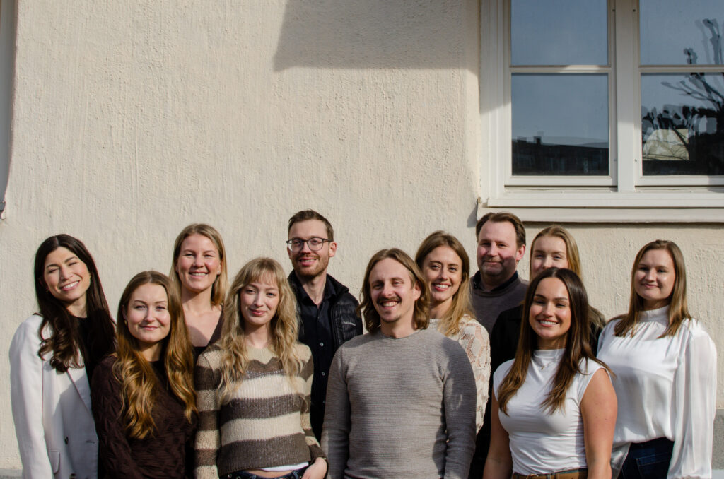 Blueberry team group photo outside the Beyond Abroad office building during an international education company event