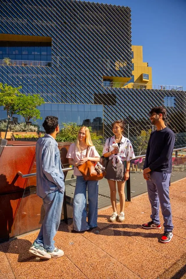 Postgraduate international students chatting at Edith Cowan University