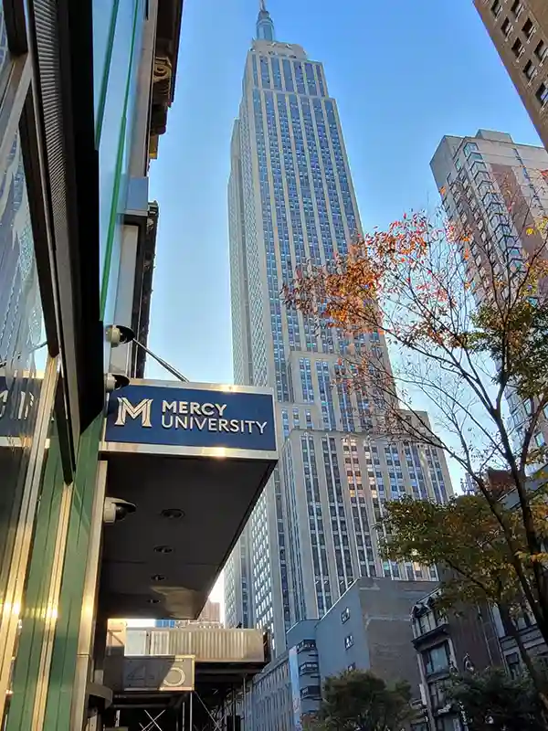 Mercy University sign in Manhattan near the Empire State Building in New York.
