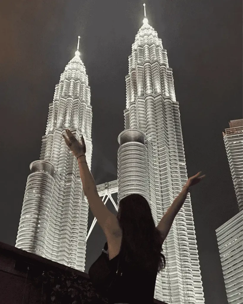Exchange student in Kuala Lumpur at KLCC at night