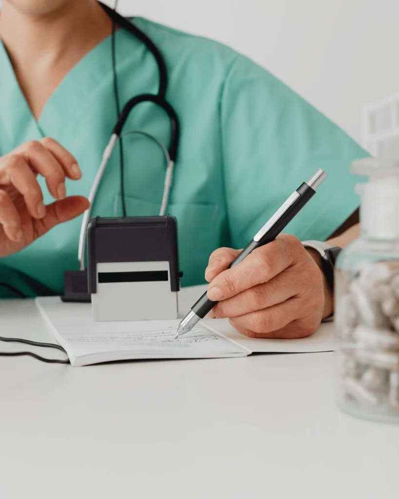 Doctor writing a prescription