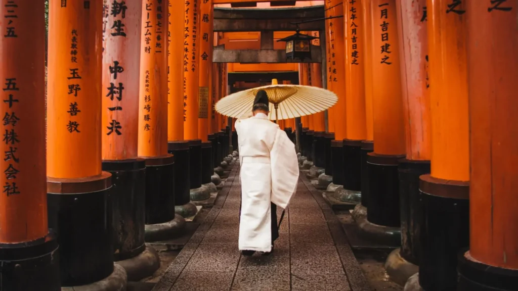 Japanese man in traditional clothing with an umbrella